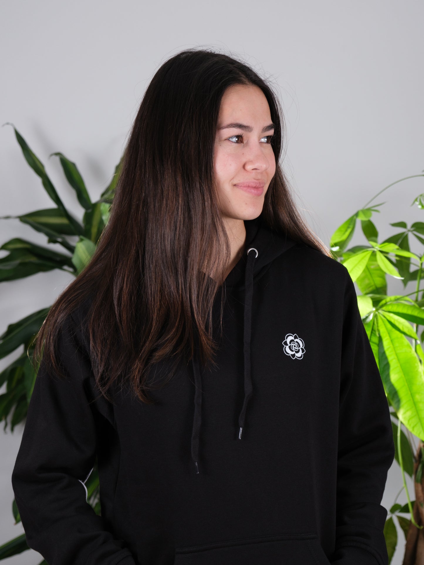 Front of the Follow the Sun Sunflower hoodie on a female model