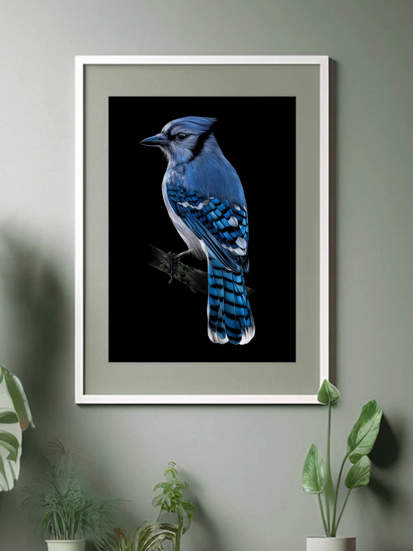 Framed Triumphant Blue Jay Art Print displayed in a stylish living space, adding a touch of vibrant nature and artistic beauty to the decor.