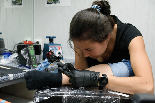 Kansinee Tattooing Herself