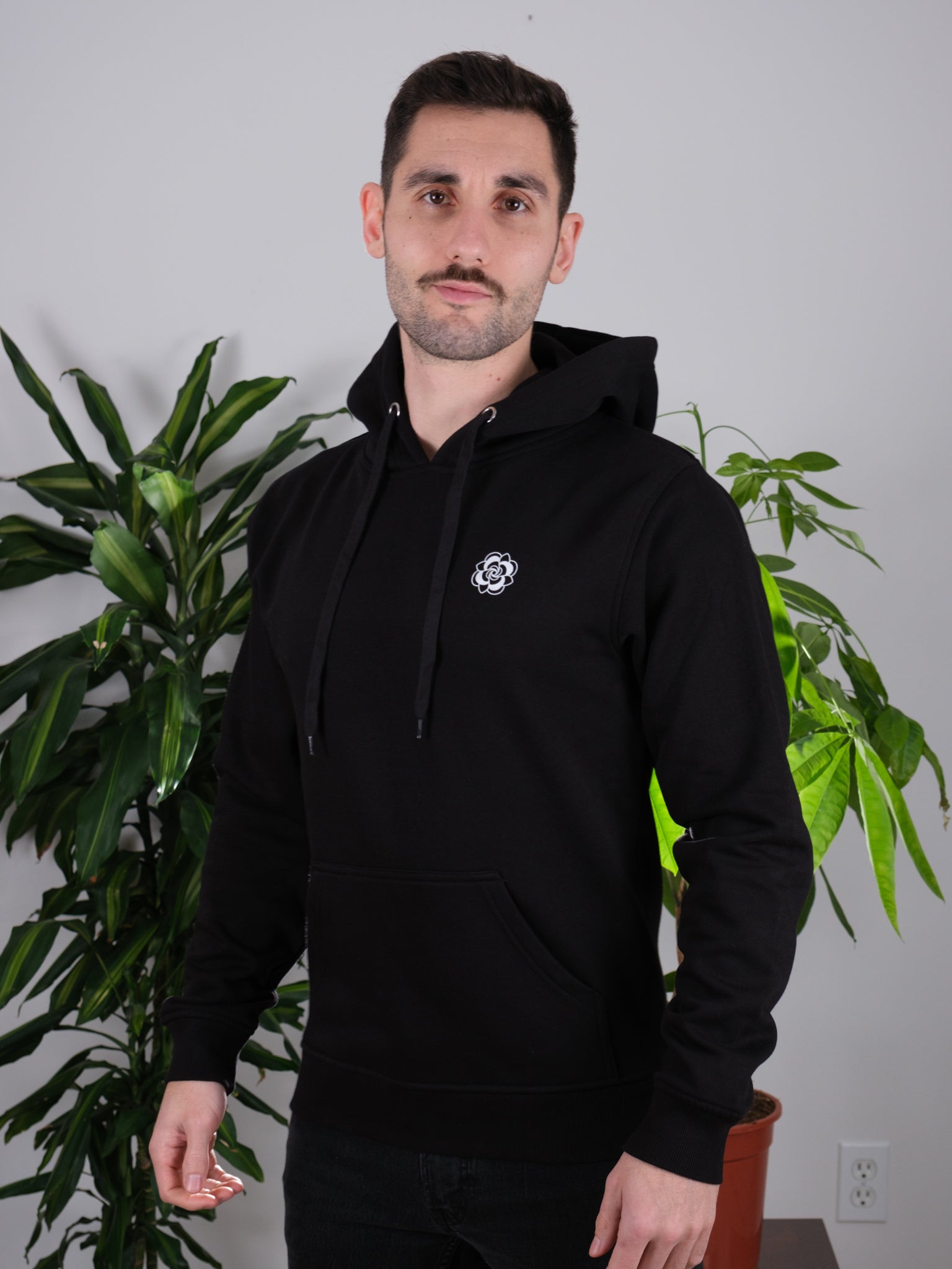 Front of the Follow the Sun Sunflower hoodie on a male model