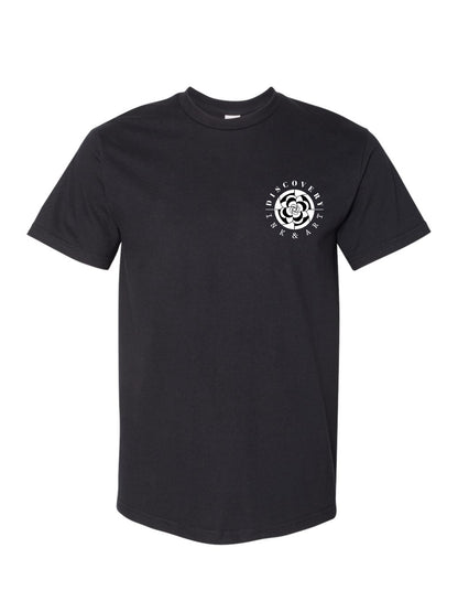 Discovery Ink & Art Logo on front of black t-shirt