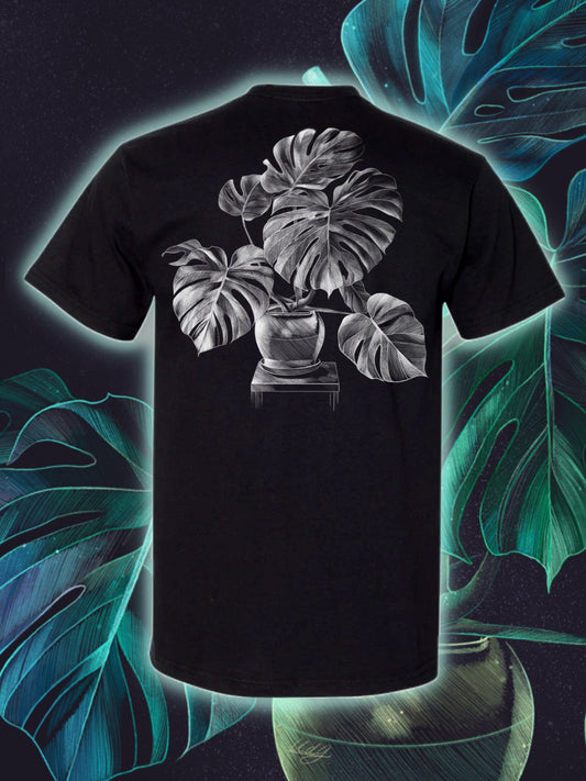 Monstera Tee with a Monstera Plant Background
