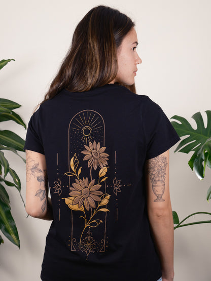 Back of T-shirt Featuring Golden Sunflowers Encased in a Geometric and Dot-work Frame. Female Model 2
