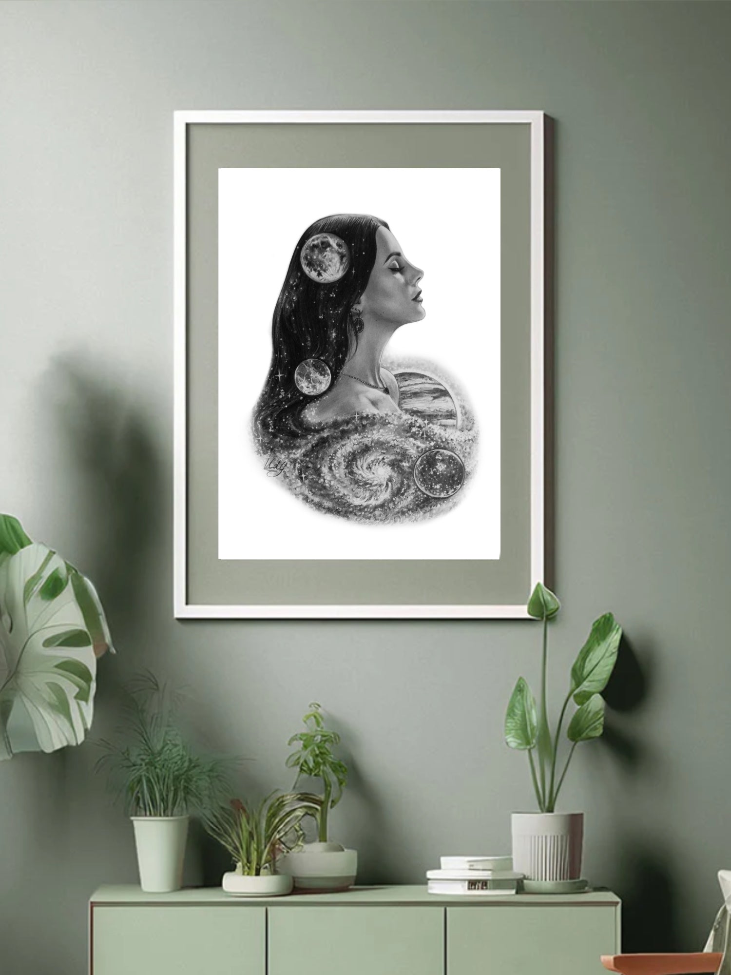 Cosmic Alignment Art Print framed and displayed in a modern living space, featuring Lana Del Rey surrounded by cosmic elements, enhancing a mystical decor theme.