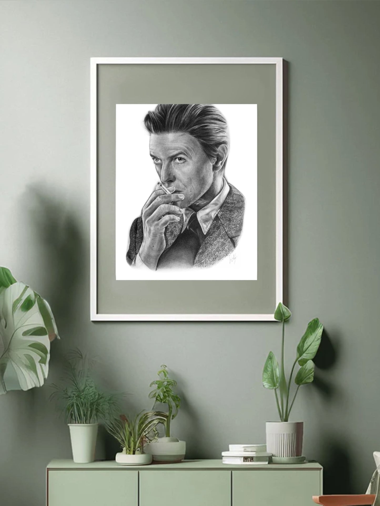 David Bowie Pencil Portrait artfully framed and placed in a stylish interior, highlighting Bowie’s timeless appeal and influence in music and culture